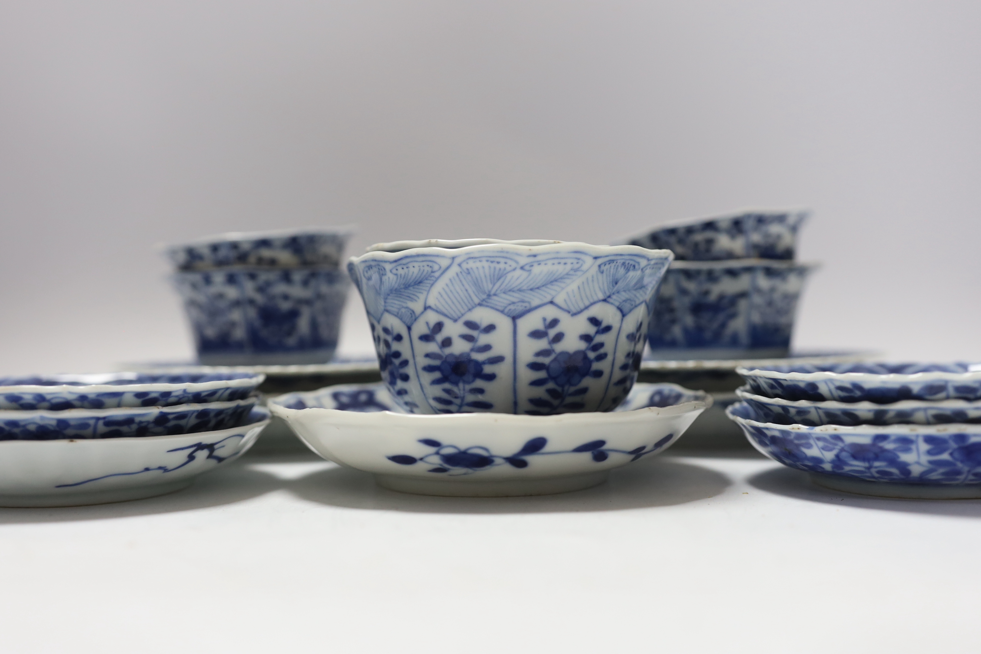 Two pairs of 19th century Chinese blue and white teabowls and saucers, a set of six other blue and white saucers, another and a teabowl, all 19th century (17)